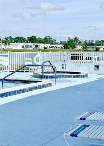 View of pool with a floating dock
