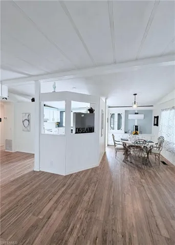 Dining space featuring wood finished floors