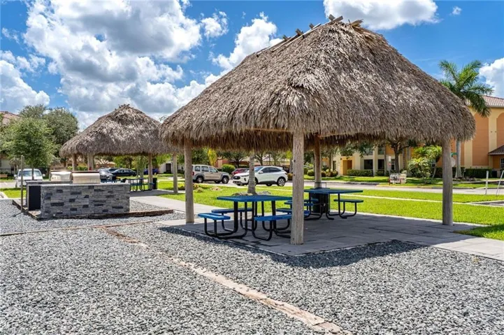 View of home's community featuring a patio area, a gazebo, and area for grilling