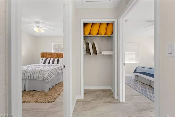 Bedroom featuring a closet and ceiling fan