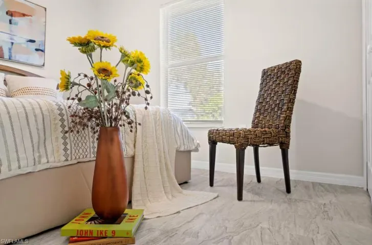 Living area featuring baseboards