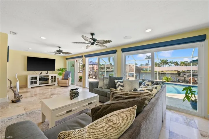Living Room just Steps to the Pool