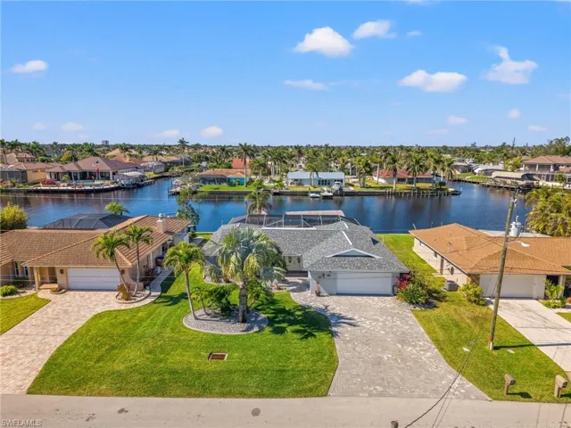 Aerial View of the Front with the Stunning Paver Driveway