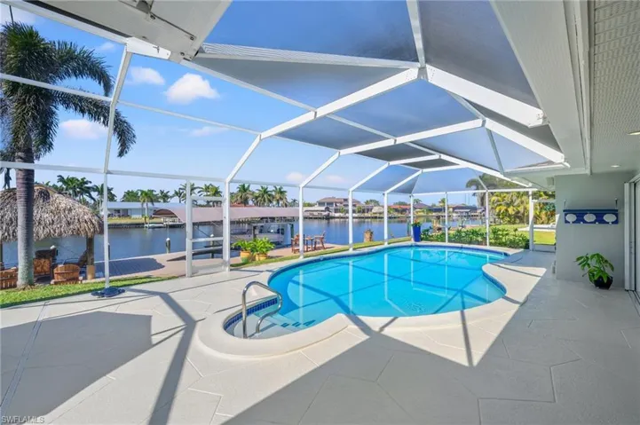 Sparkling Freeform Pool with Screen Cage