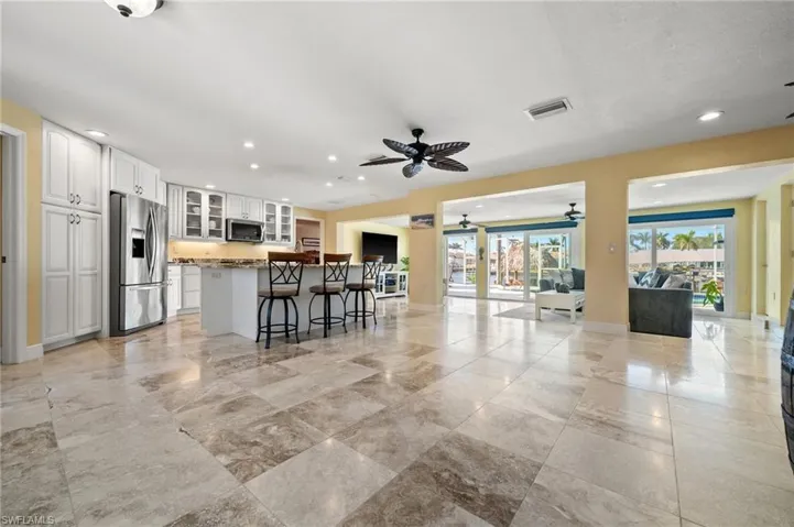 View from the Front to the Kitchen, straight through to the pool and Canal
