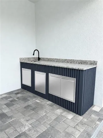 Outdoor kitchen cabinet with sink