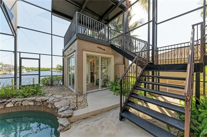 Property entrance featuring a water view