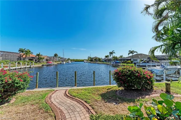 Property view of water featuring a boat dock