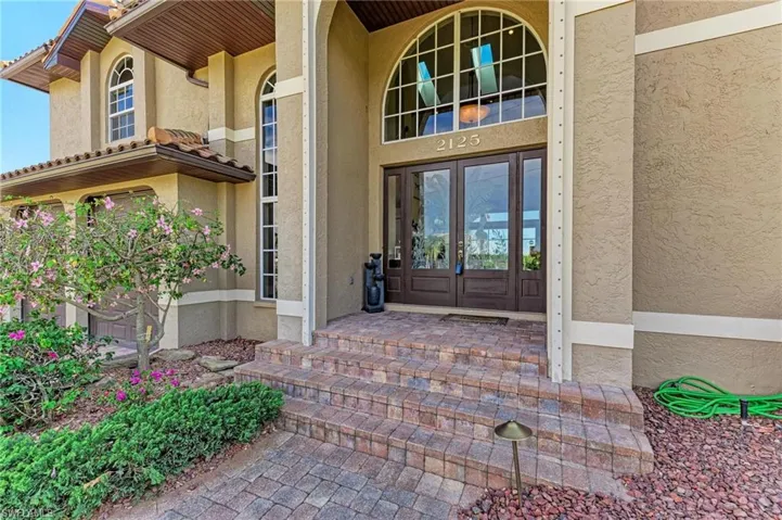Property entrance with french doors