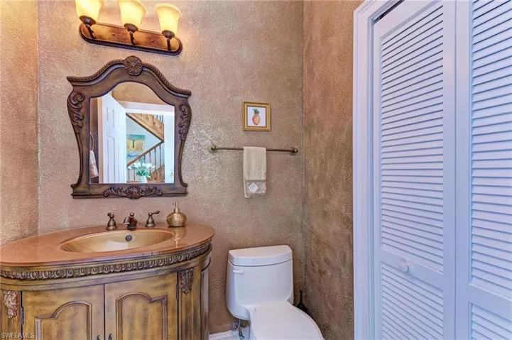 Bathroom with vanity and toilet