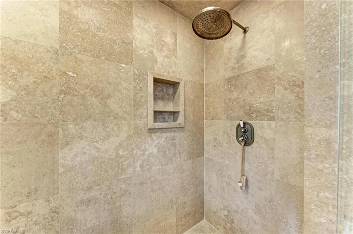 Details featuring tiled shower