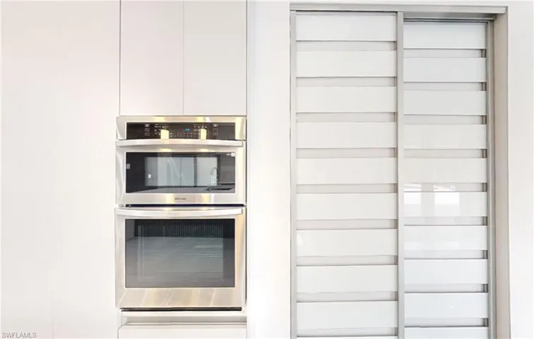 Room details featuring stainless steel double oven