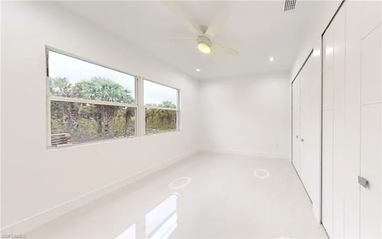 Unfurnished bedroom featuring visible vents, baseboards, recessed lighting, and a closet