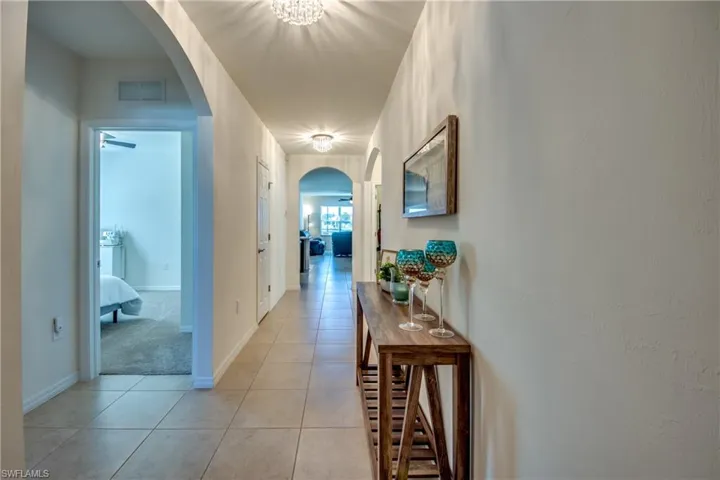 Hall featuring light color tile