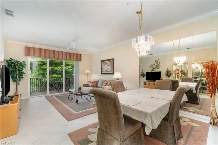 The great room in this 2nd floor condo overlooks the beautiful preserve.