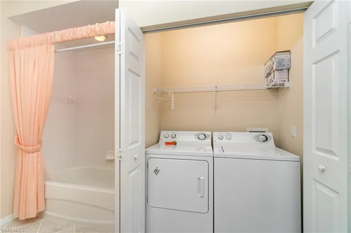 Laundry - washer & dryer, is located in the guest bathroom.