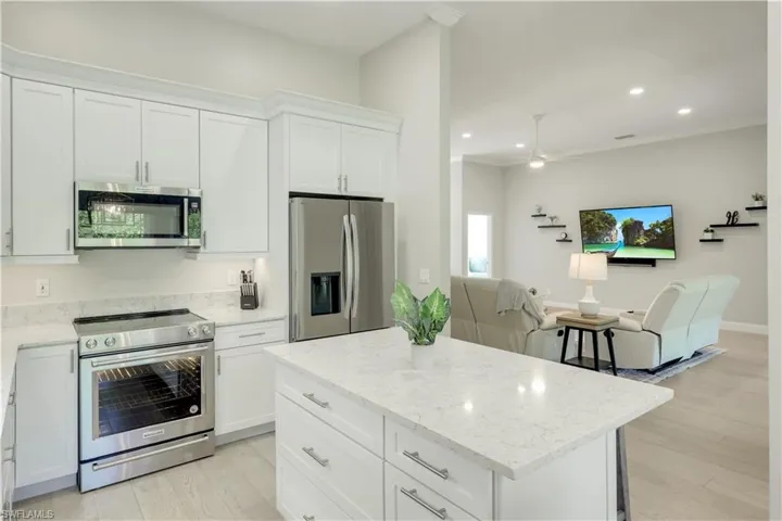 Kitchen with Island and New Fridge