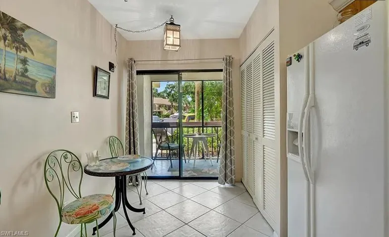 Doorway with tile patterned flooring