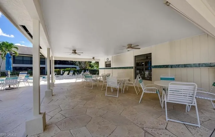View of patio / terrace featuring outdoor dining area and a ceiling fan