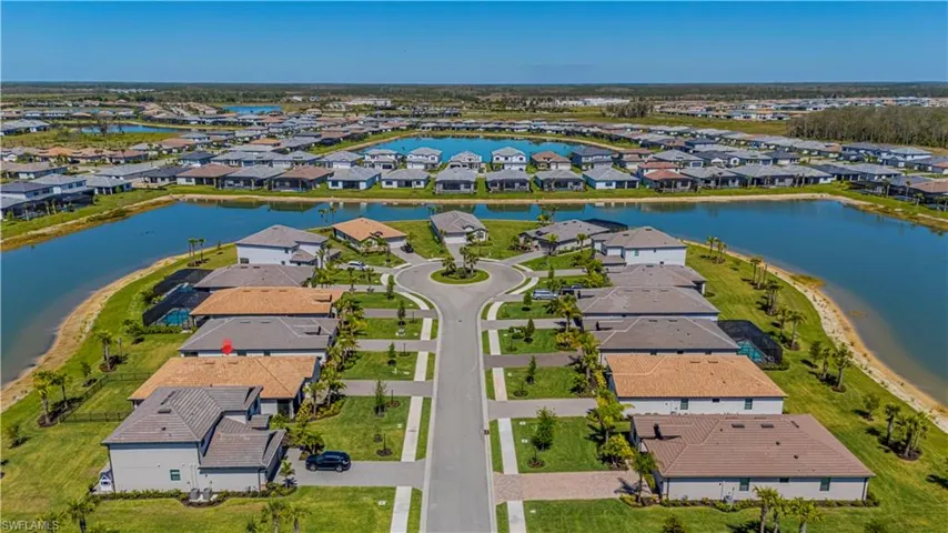 Aerial view with a residential view and a water view