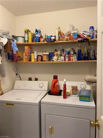 Laundry with extra storage. The water heat is also in this room.