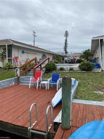 Dock area. New railings will be replaced when the pool cage is replaced, expected shortly.