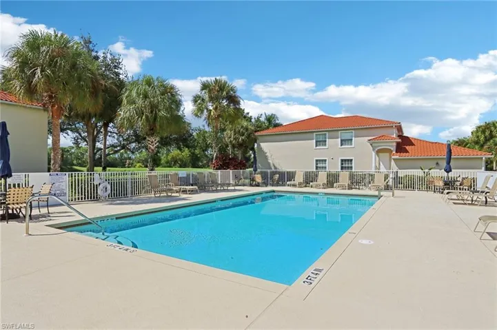 Community pool featuring a patio area