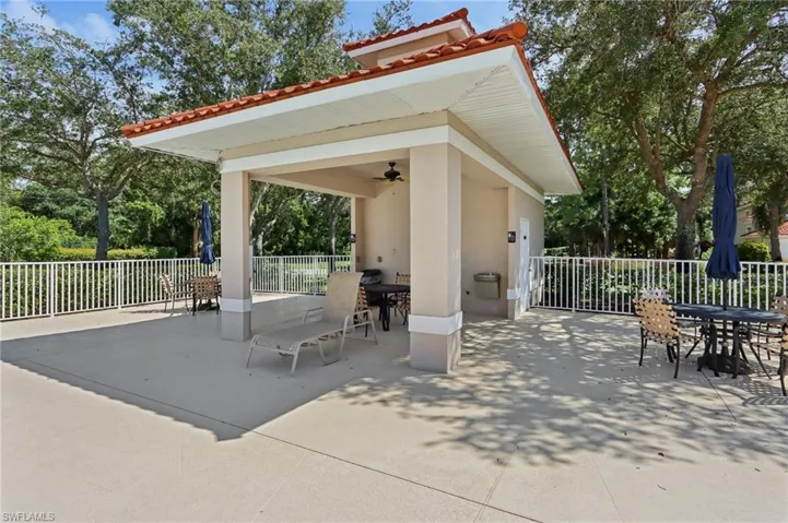 View of patio / terrace with outdoor dining area and a ceiling fan