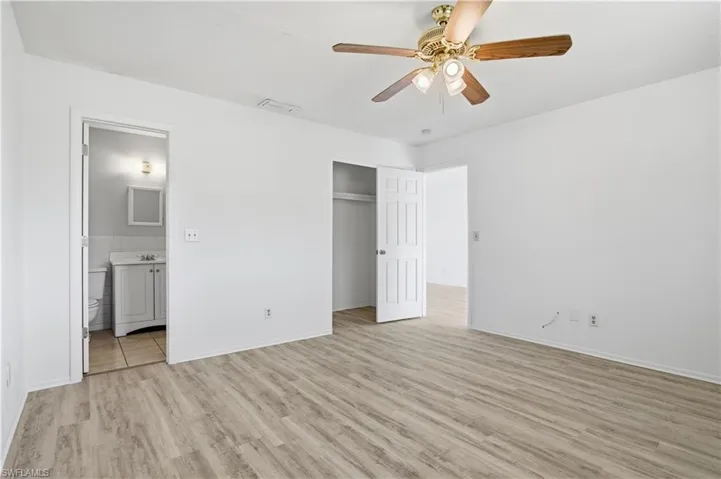 Bathroom with shower / bath combination and vanity