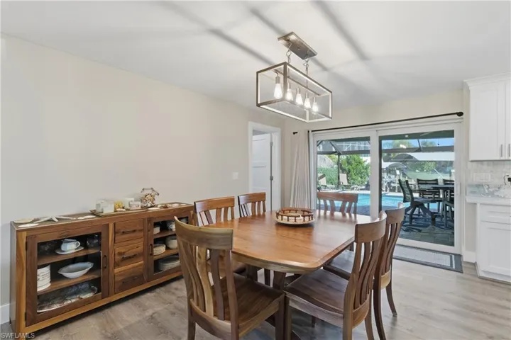 Dining Room Area with views of the pool and lanai