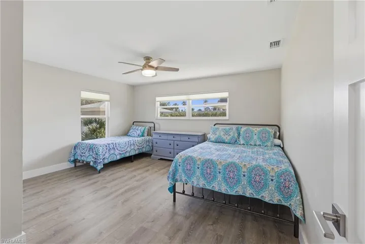 3rd Bedroom with views of the backyard and canal