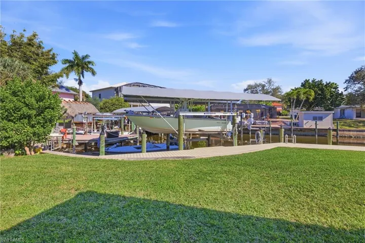 Covered Boat Lift and Dock