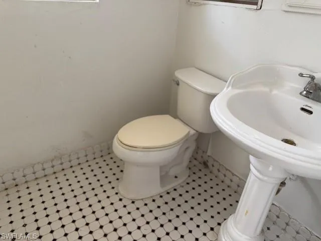 Bathroom with tile patterned flooring