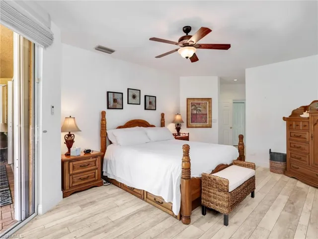 Bedroom featuring a ceiling fan and light wood finished floors