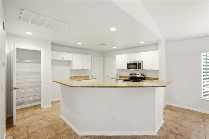 1036 Belmont St E, Lehigh Acres, Florida 33974