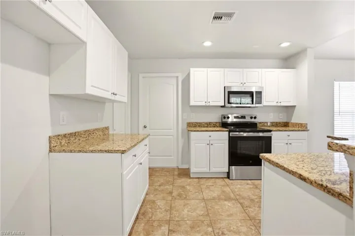1036 Belmont St E, Lehigh Acres, Florida 33974