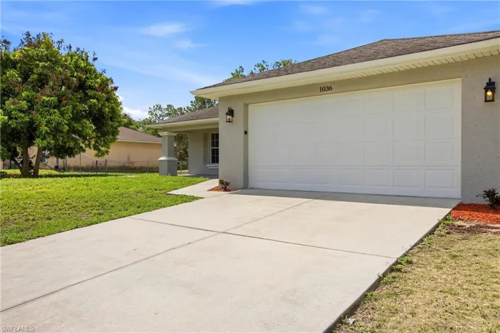1036 Belmont St E, Lehigh Acres, Florida 33974