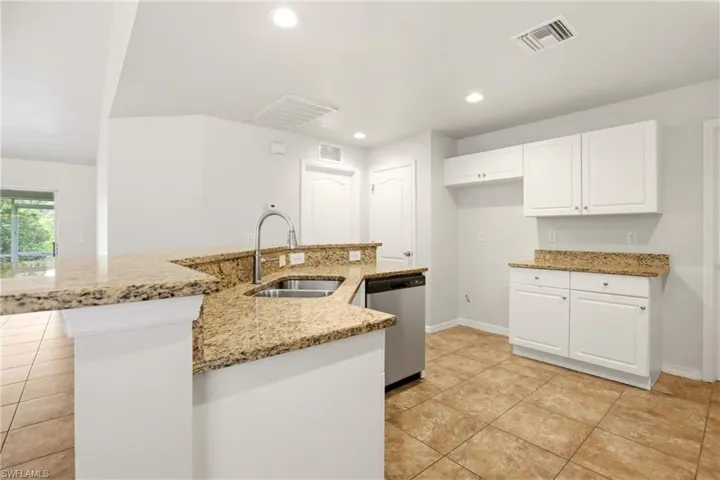 1036 Belmont St E, Lehigh Acres, Florida 33974