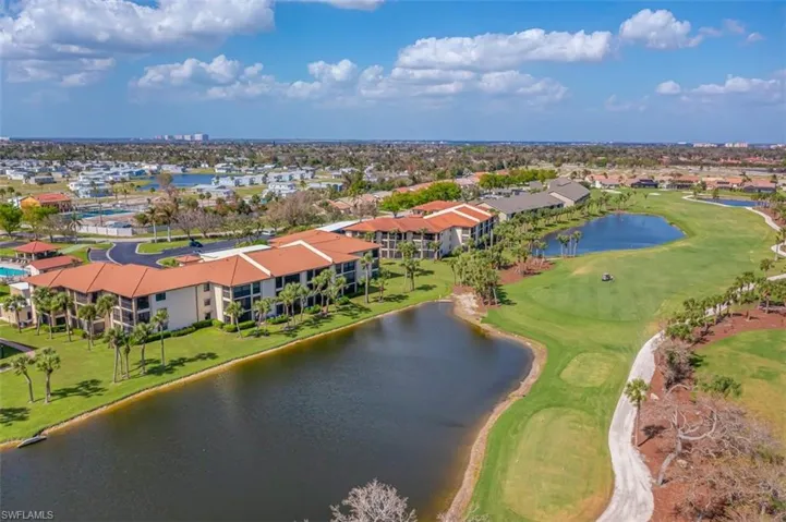 Aerial view of a nearby body of water and a golf course