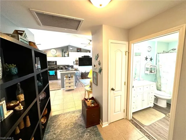 Spacious hallway between living room and guest bedrooms