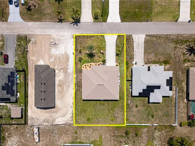 Aerial overview of property's location featuring property boundaries highlighted