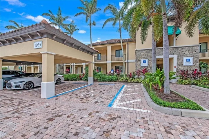 Under roof parking space is directly in front of unit