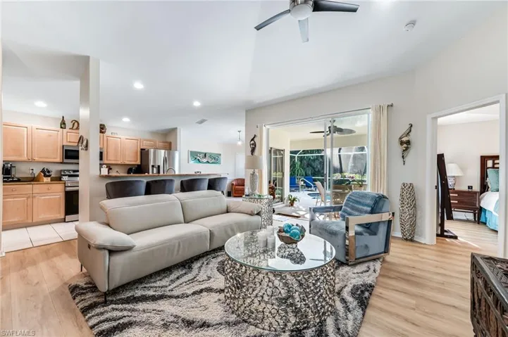Living room open to kitchen and covered lanai