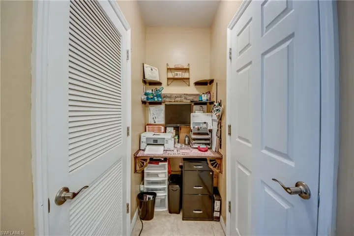 Office space featuring light tile patterned floors