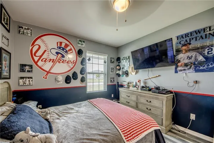Bedroom featuring wood finished floors