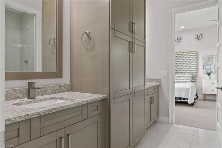 Bathroom featuring vanity and tile patterned floors