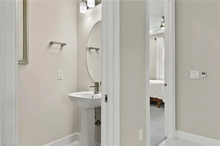 Bathroom featuring ceiling fan