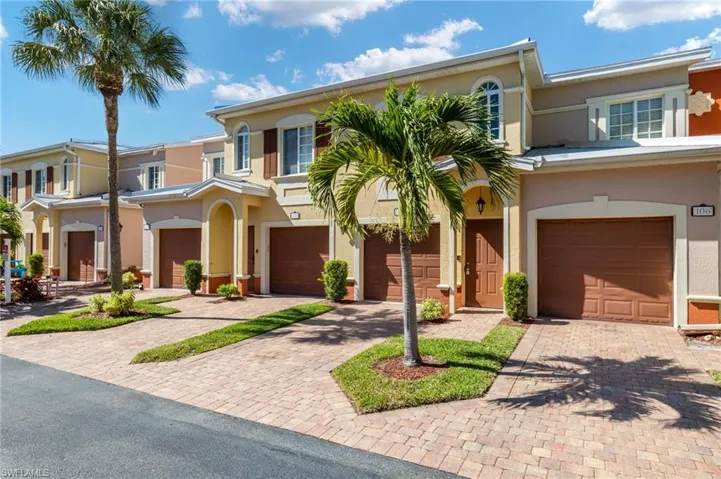 Mediterranean / spanish house featuring stucco siding, driveway, and an attached garage