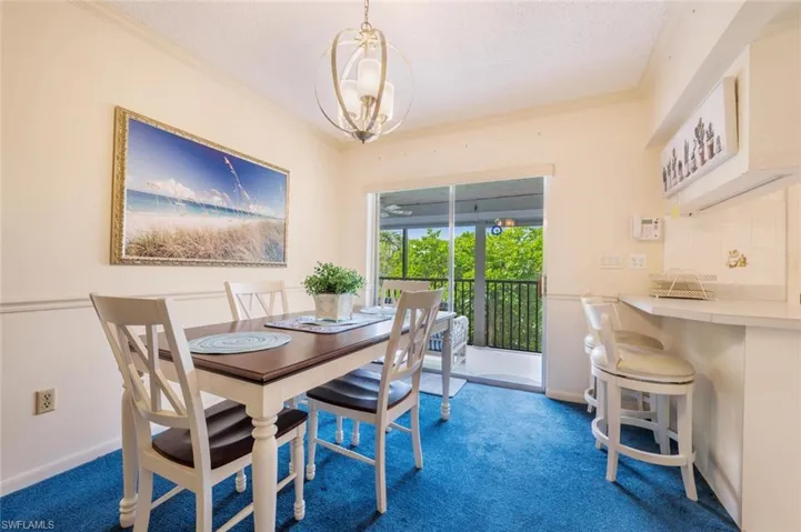 Dining area.  Nice counter with stools.