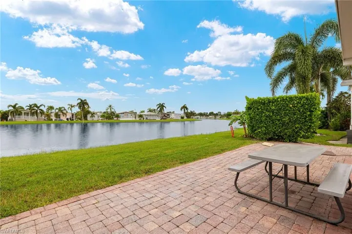 View of patio / terrace featuring a water view